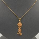 ⁦عقد وردتي ذهب عيار 21 الوزن 1.97 جرام⁩ - الصورة ⁦5⁩