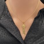 عقد وردتي ذهب عيار 21 الوزن 1.97 جرام