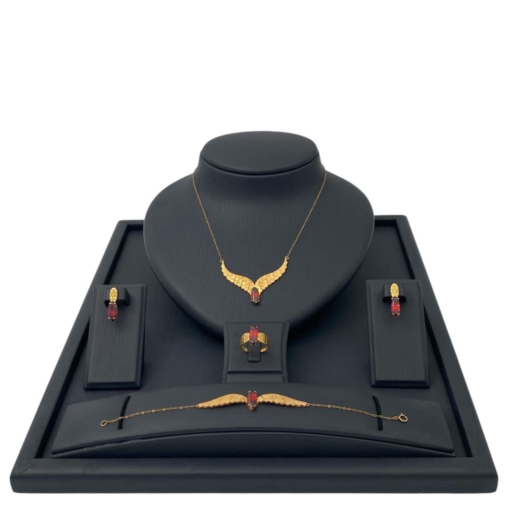 طقم جناح الصقر ذهب عيار 21 الوزن 9.18 جرام طقم جناح الصقر ذهب عيار 21 الوزن 9.18 جرام