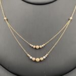 ⁦طقم ذهب عيار 18 وزن 7.98 جم تصميم كرات فخمة تليق بك لإطلالة ساحرة⁩ - الصورة ⁦7⁩