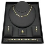 طقم بوفو الإيطالي عيار 18 وزن 28.60 جم مزين باللونين الذهبي والأخضر