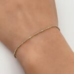 ⁦اسواره ذهب عيار 18 الوزن 1.48 جرام⁩ - الصورة ⁦2⁩