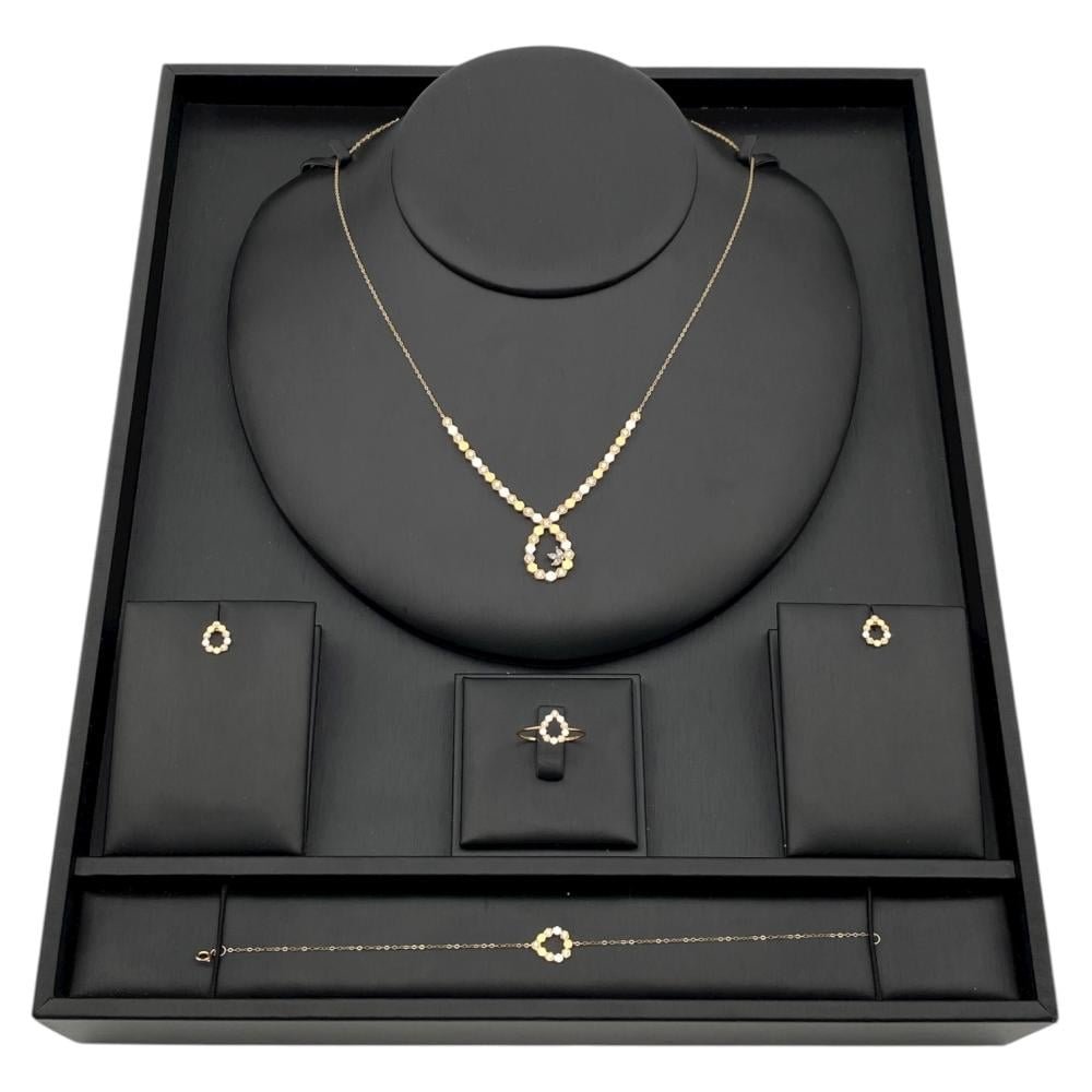 طقم ذهب عيار 18 الوزن 5.88 جرام طقم ذهب عيار 18 الوزن 5.88 جرام