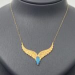 ⁦طقم ذهب جناح الصقر عيار 21 وزن 8.95 جرام بفص تركواز لامع بتصميم أنيق لا مثيل له⁩ - الصورة ⁦3⁩