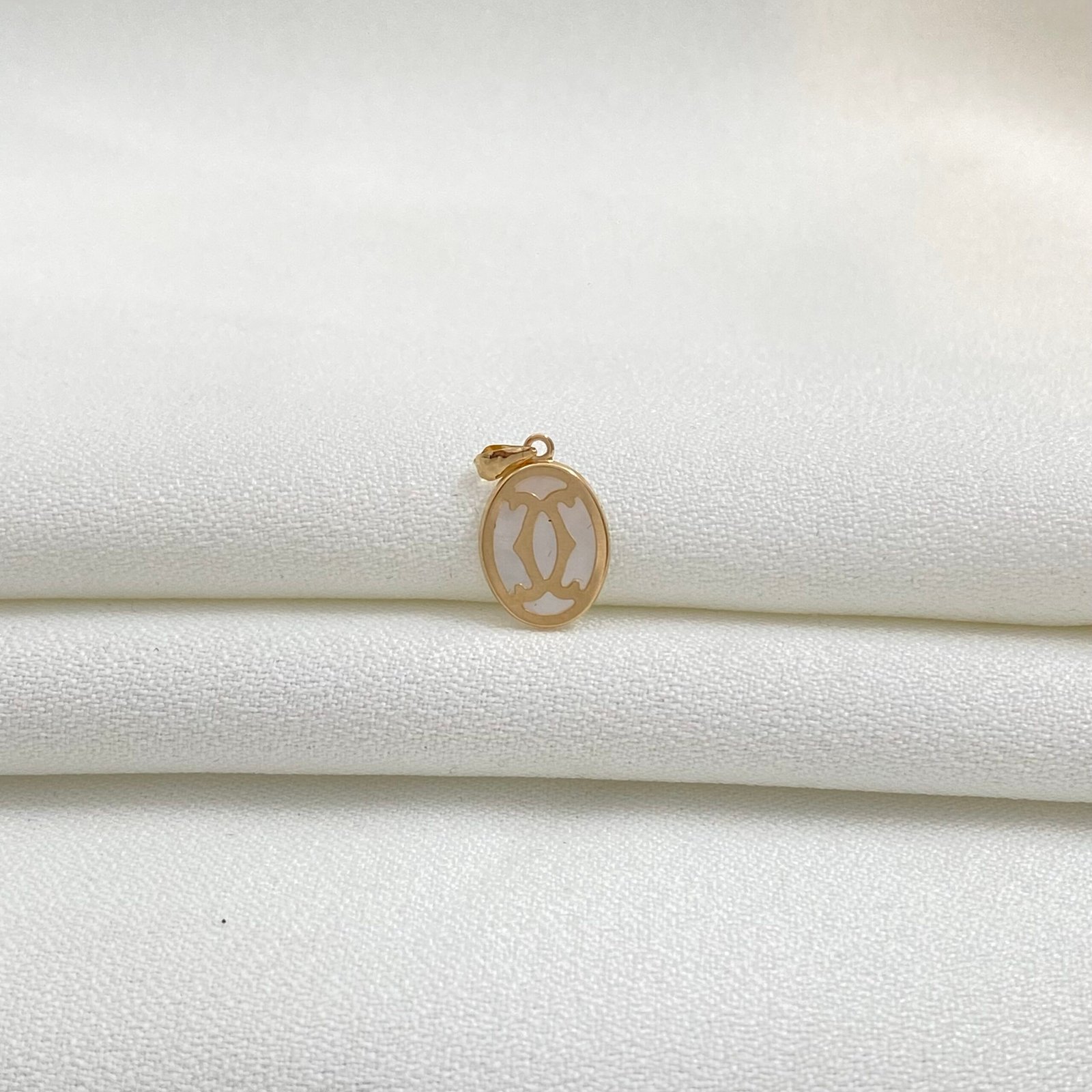 img_9067 تعليقه ذهب عيار 18 الوزن 0.35 جرام - الصورة 1